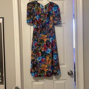 New York and Company dress. Very cute for work . Never worn .MEDIUM